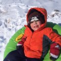 Nick snow tubing at Grammy's